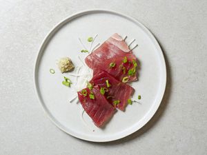 Tuna Sashimi With Daikon and Ginger on a plate 