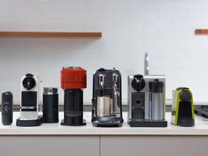 Assortment of Nespresso machines we recommend displayed side by side on a kitchen countertop 