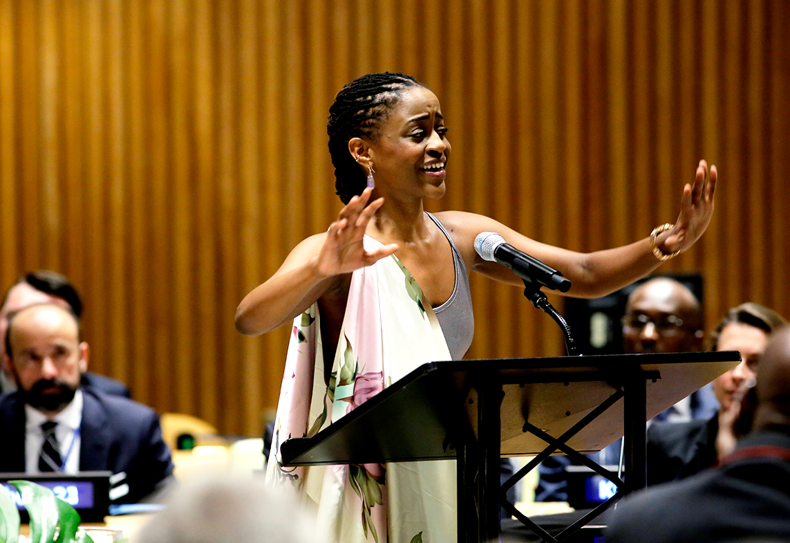 Malaika Uwamahoro, Artist and Rwandan student at Fordham University, New York, performs during the annual commemoration.