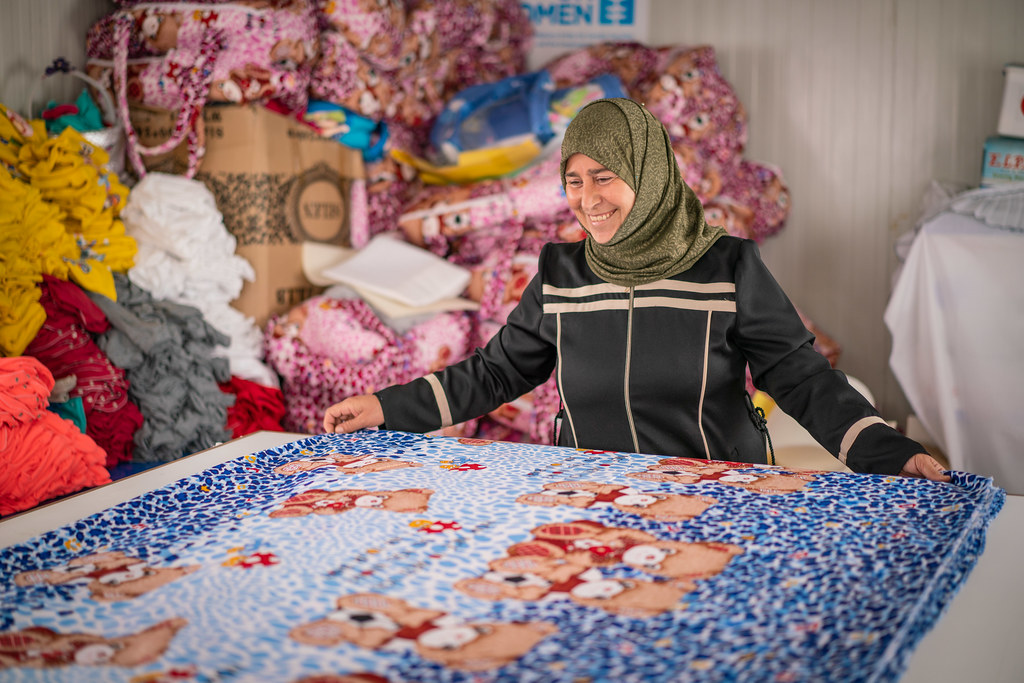 woman cutting fabric