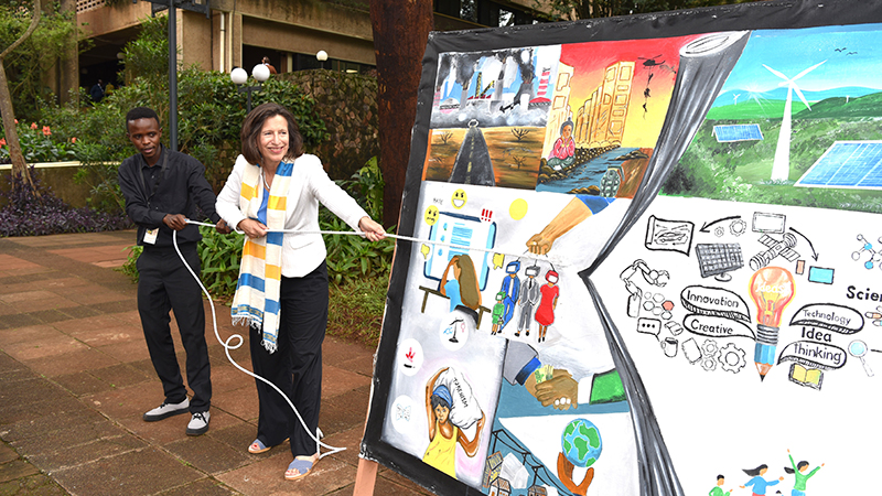 USG Mellissa Fleming with the interactive mural 