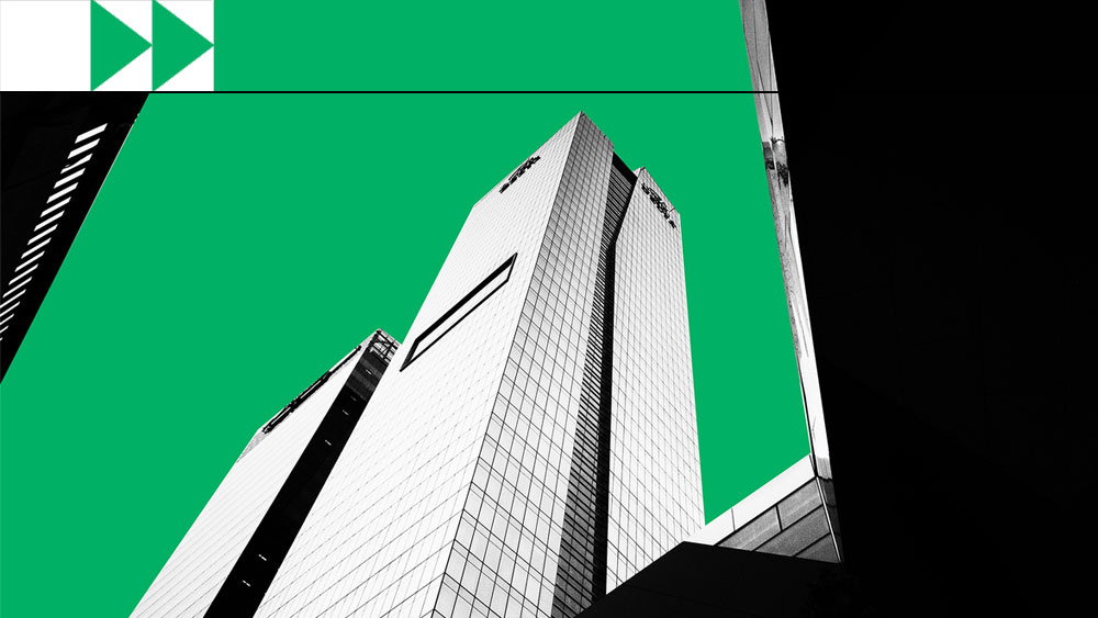 photocomposition: one building viewed from below, in black and white and green