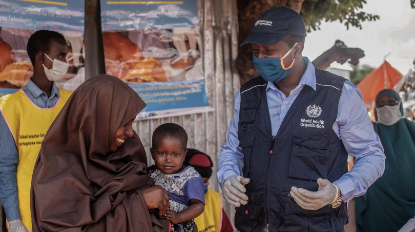 A young girl waits to be vaccinated in Mogadishu, Somalia.