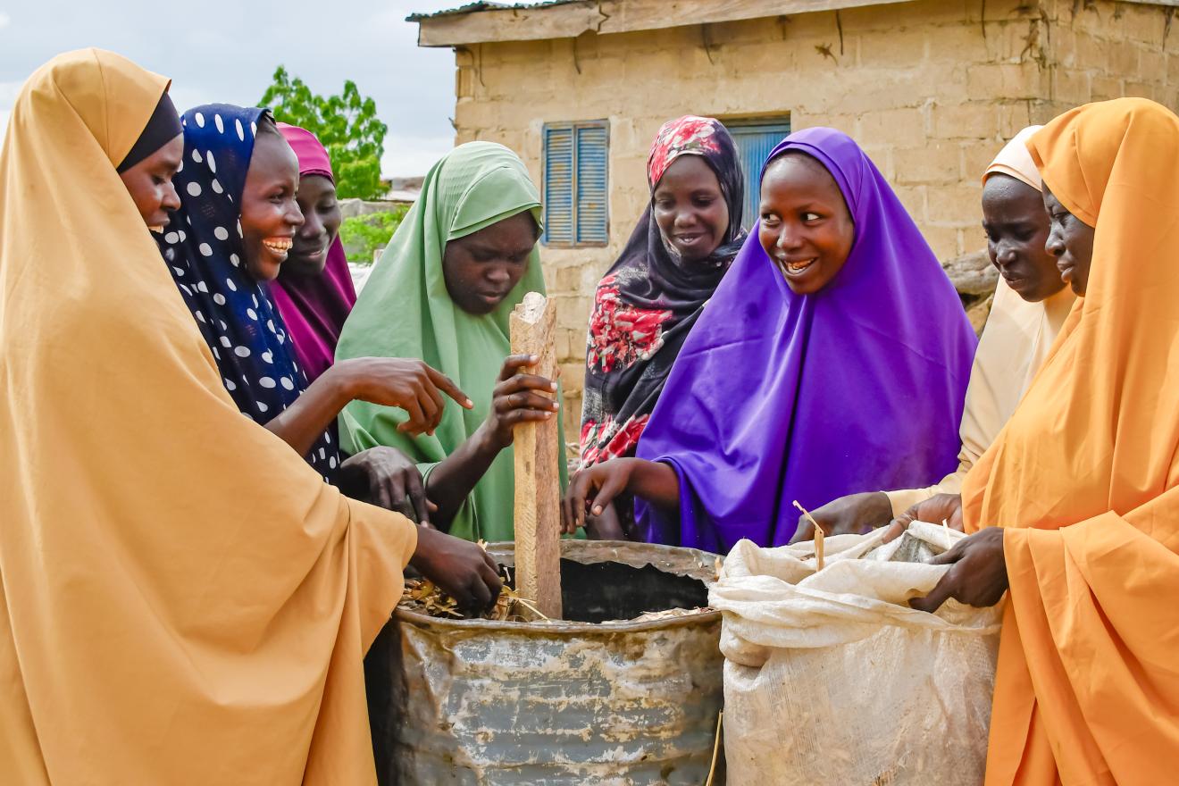 women making briquettes