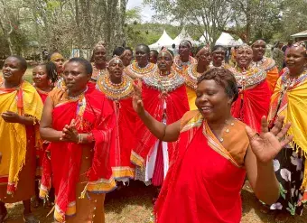 People take part in celebrations to mark the signing of declarations by council of elders in Kenya's Samburu and Mt. Elgon regions to end the practice of female genital mutilation.