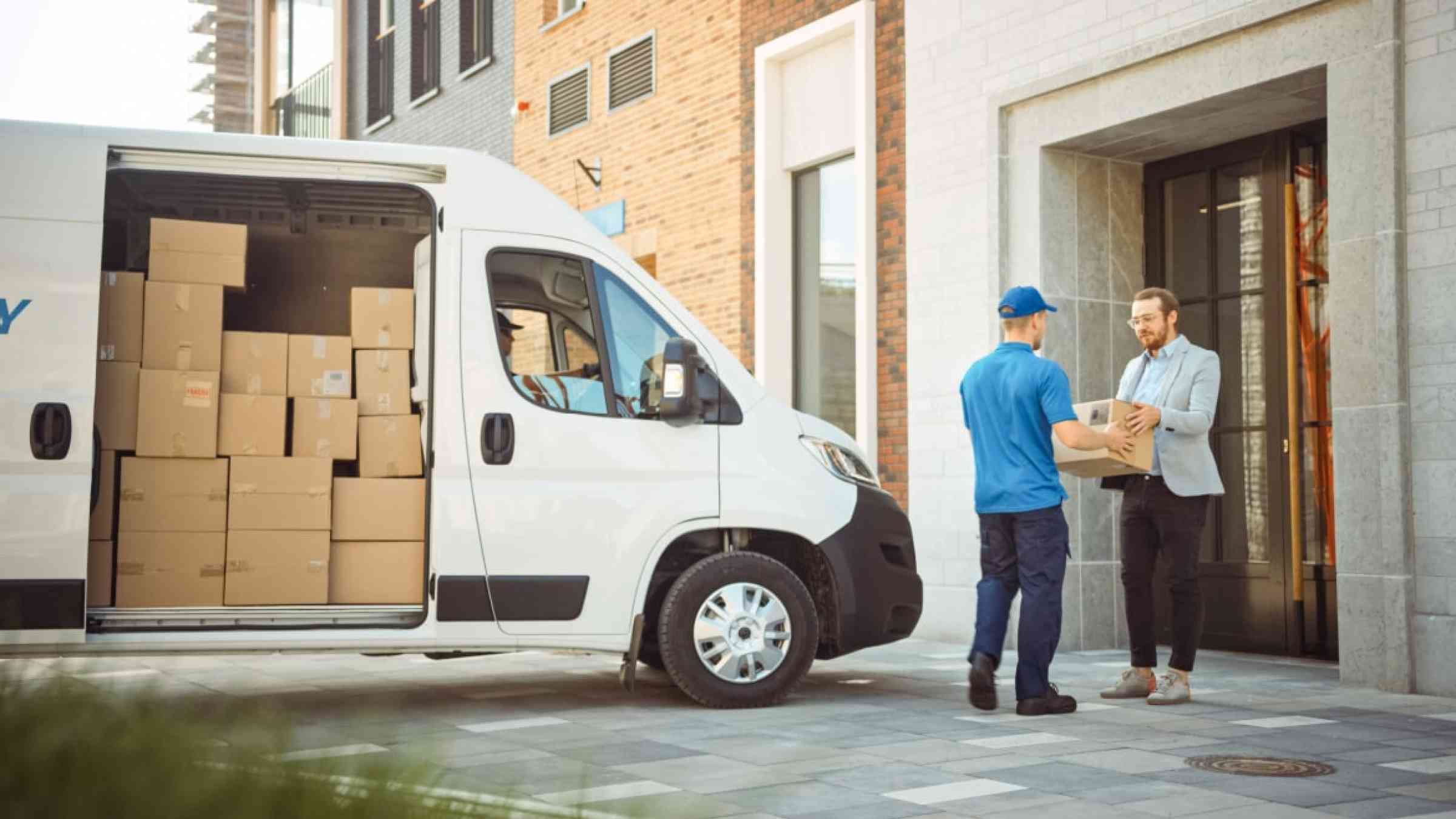 Man delivering a parcel to a client.