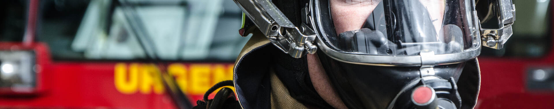 Fireman with breathing mask close up