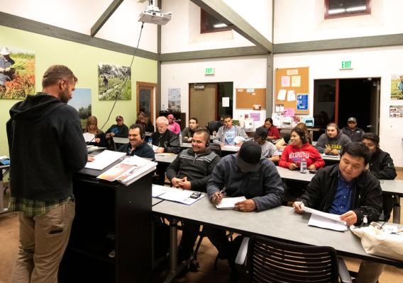 A teacher and students in a classroom