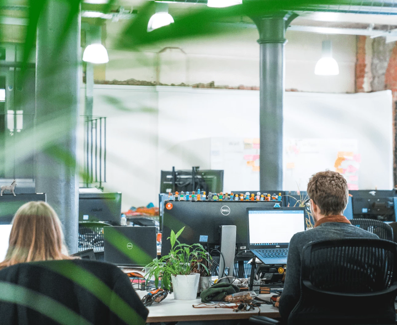 Zone office in Bristol, an open office space with people working on their computers