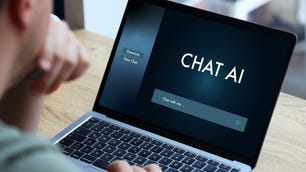 Person using chat AI on laptop