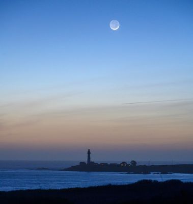 The young moon setting