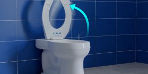 The new Cleana toilet. An arrow shows how the seat opens and closes automatically.