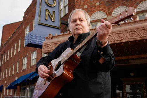 john hinckley playing guitar