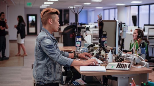 ubiquity working at desk