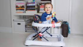 Baby playing in a walker