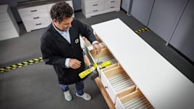 CR's Test Program Leader for Safety and Sustainability, Juan Alberto Arguello, PhD. conducting the Furniture Tip Over test on the IKEA HEMNES 8-drawer dresser.