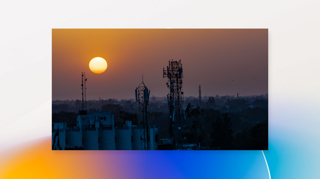 Skyline of industrial city district at dusk.