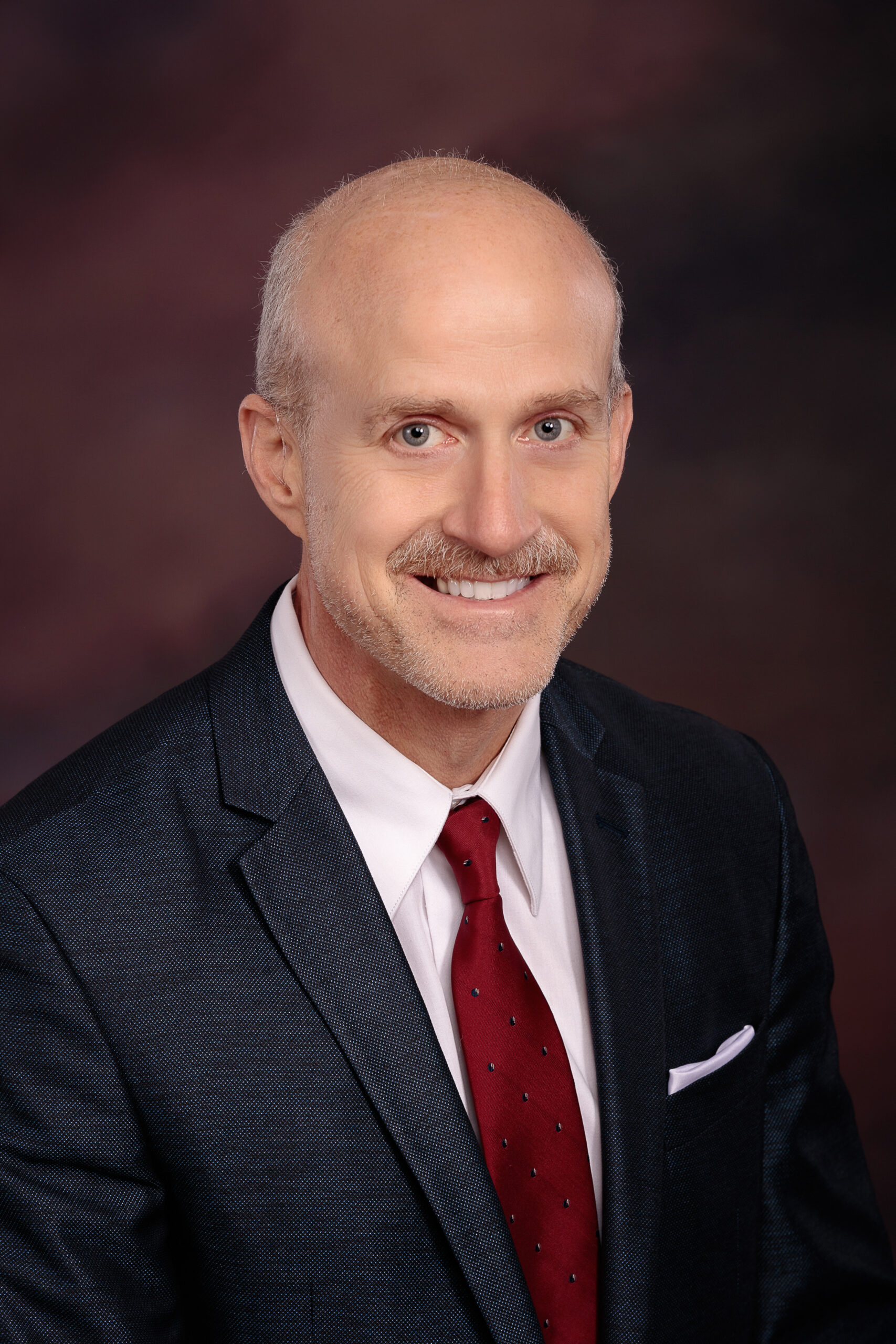 a man wearing a suit and tie