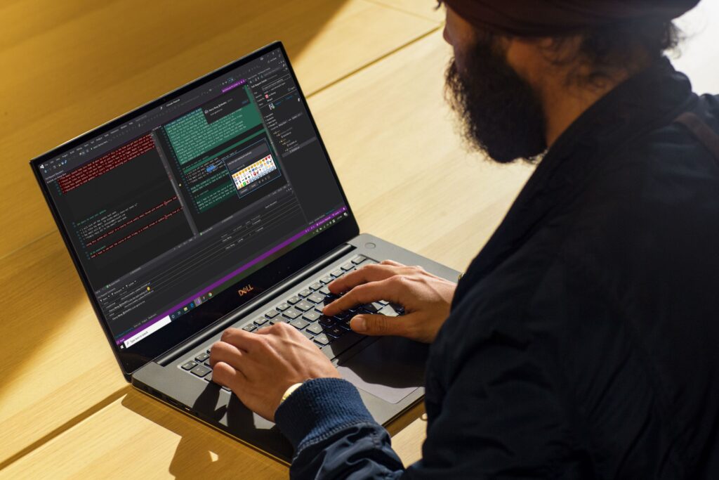 a man using a laptop computer