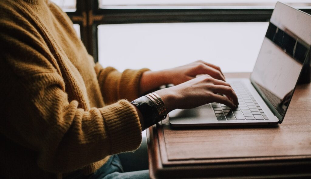 a man using a laptop computer