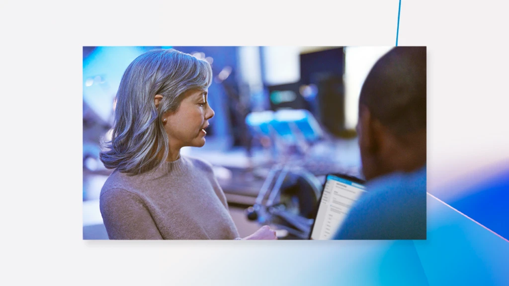 two people looking at a computer screen