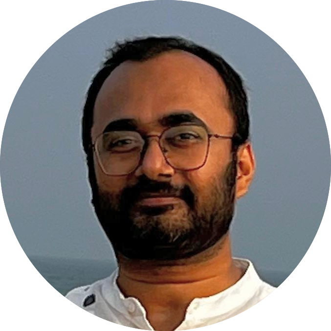 This is what Jayesh Bhoot looks like, with a lopsided smile on its right, which almost closes his right eye while smiling, which strongly implies that he needs to work on his lazy left-side cheek muscles.