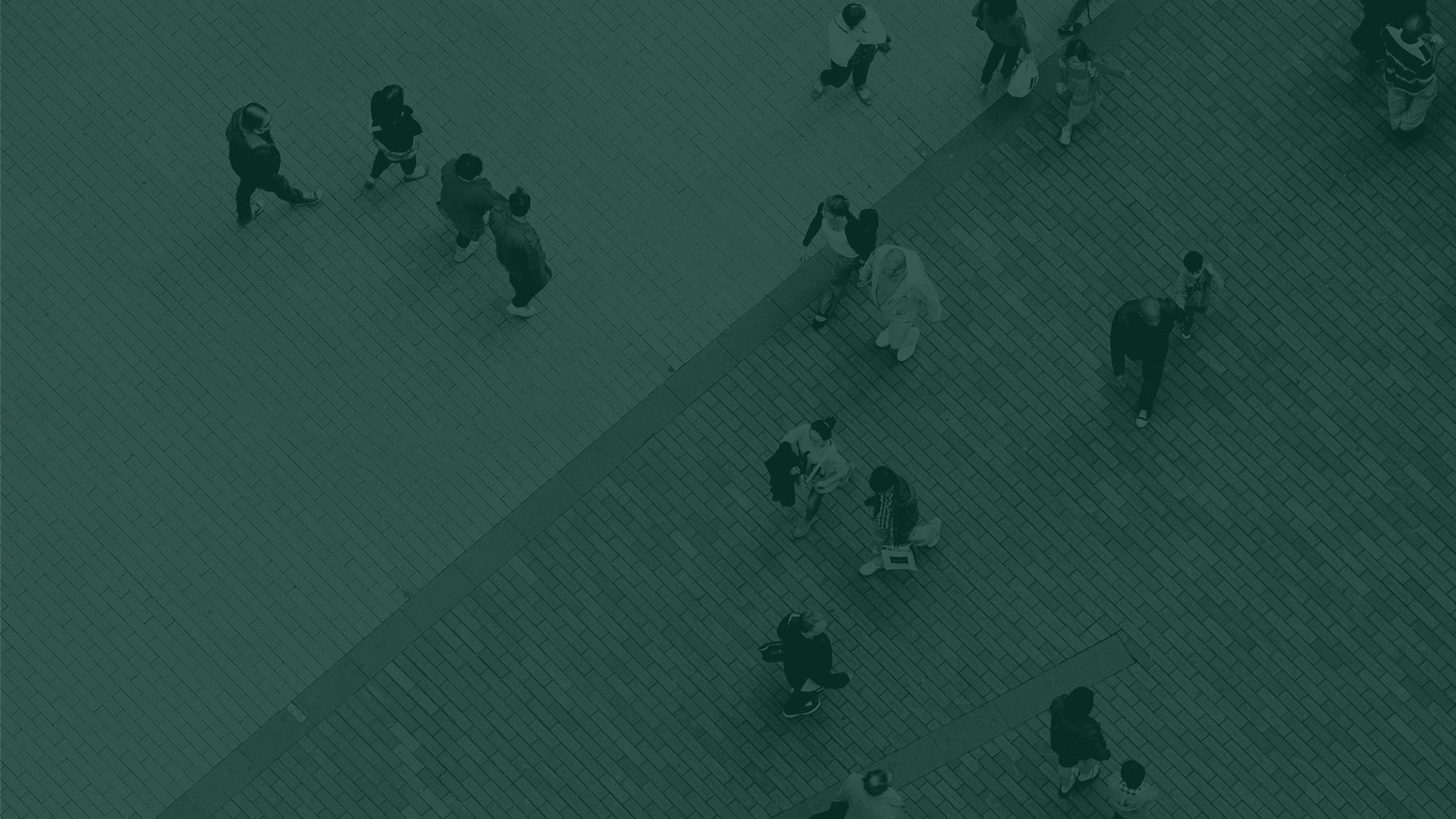 Tinted image of people crossing a street