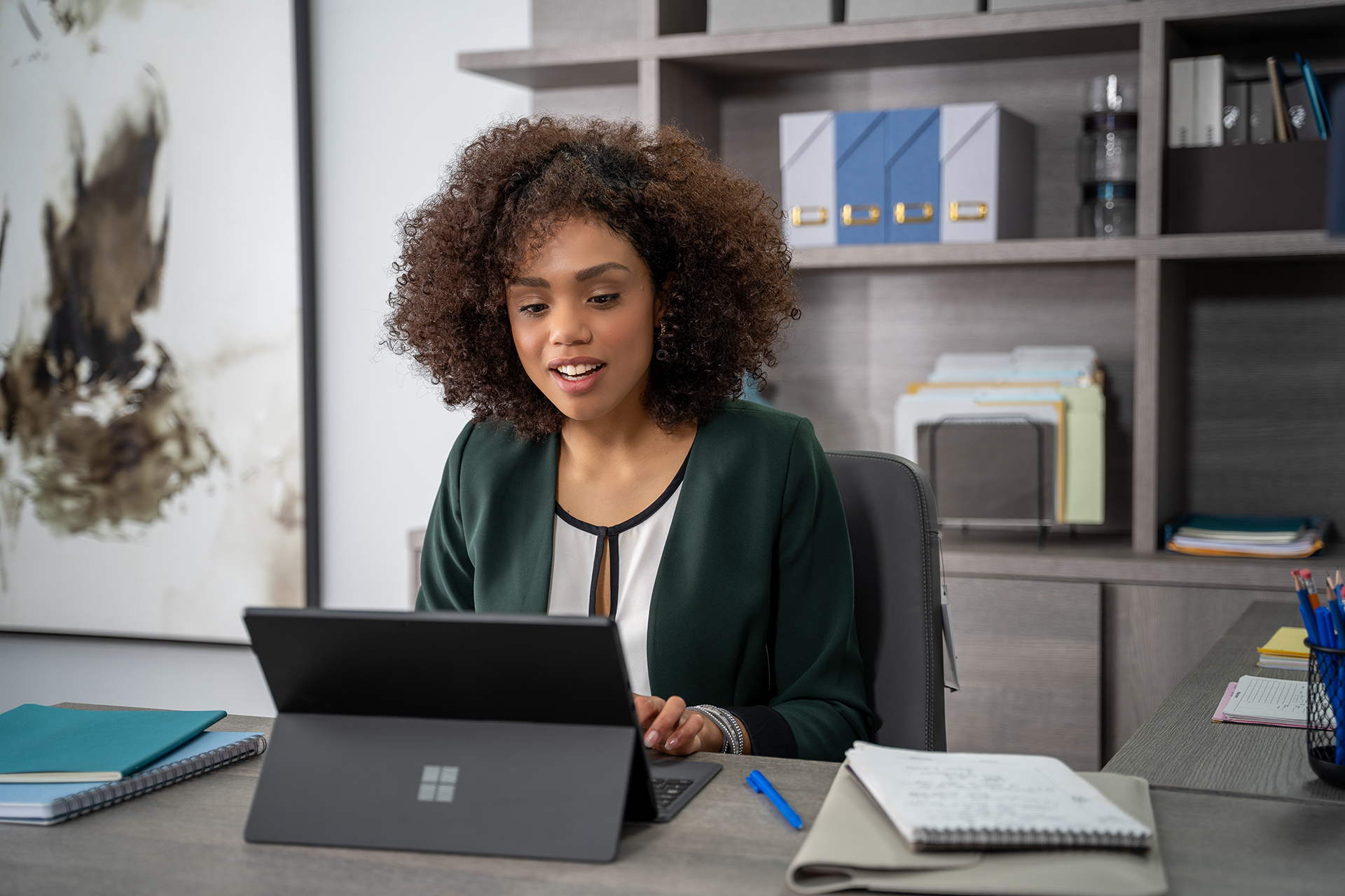 Woman using Surface device