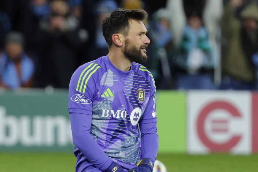 Los Angeles FC goalkeeper Hugo Lloris (1) kneels after Minnesota United forward Bongokuhle Hlongwane.