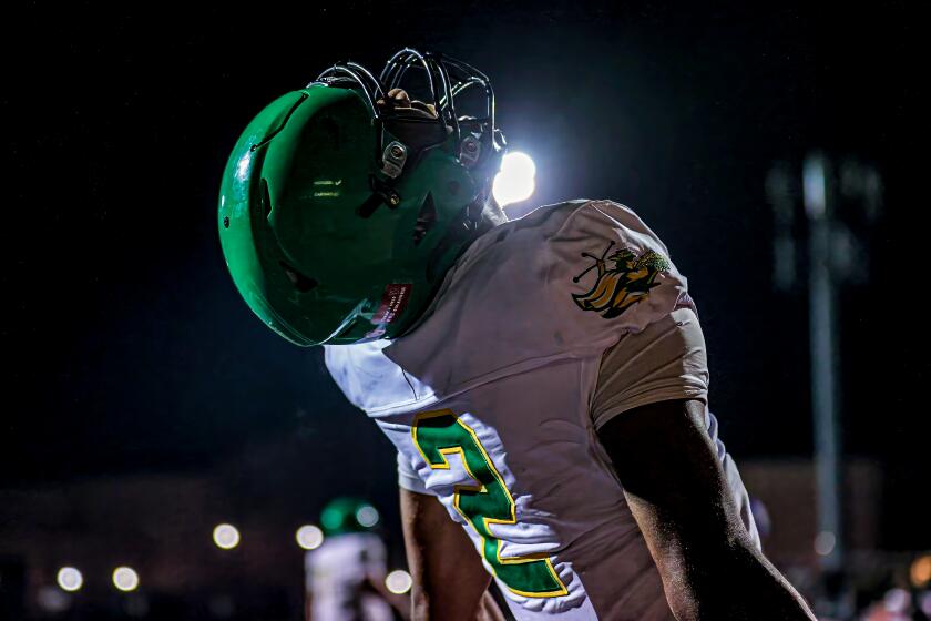 Quarterback Jaden O'Neal of Narbonne celebrates a victory over Cathedral last month in a nonleague game.