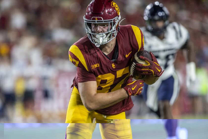 LOS ANGELES, CA - SEPTEMBER 07: USC tight end Lake McRee (87) makes a reception in the second quarter of a college football game between the Utah State Aggies and the USC Trojans on September 7, 2024, at L.A. Memorial Coliseum in Los Angeles, California. (Photo by Tony Ding/Icon Sportswire via Getty Images)