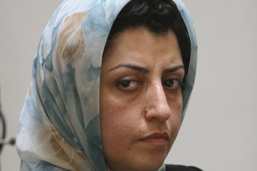 FILE - Prominent Iranian human rights activist Narges Mohammadi attends a meeting on women's rights in Tehran, Iran, on Aug. 27, 2007. (AP Photo/Vahid Salemi, File)