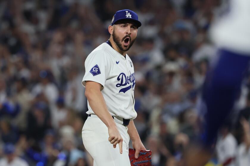 Dodgers relief pitcher Alex Vesia reacts after earning the last out in the ninth inning of Game 2 of the World Series 