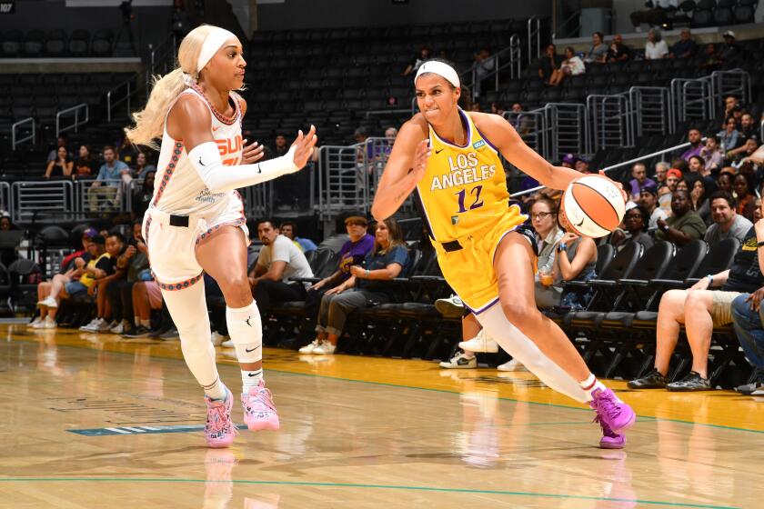 LOS ANGELES, CA - SEPTEMBER 10: Rae Burrell #12 of the Los Angeles Sparks goes to the basket during the game on September 10, 2024 at Crypto.com Arena in Los Angeles, California. NOTE TO USER: User expressly acknowledges and agrees that, by downloading and/or using this Photograph, user is consenting to the terms and conditions of the Getty Images License Agreement. Mandatory Copyright Notice: Copyright 2024 NBAE (Photo by Juan Ocampo/NBAE via Getty Images)