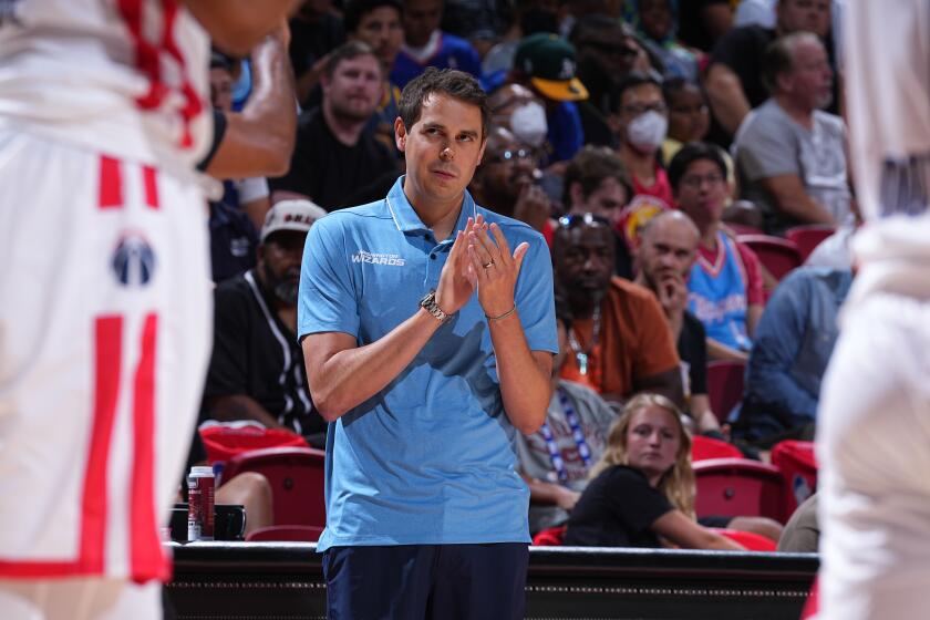 Las Vegas, NV - JULY 9: Zach Guthrie coach of the Washington Wizards looks on during the game against the Detroit Pistons during the 2022 Las Vegas Summer League on July 9, 2022 at the Thomas & Mack Center in Las Vegas, Nevada. NOTE TO USER: User expressly acknowledges and agrees that, by downloading and/or using this Photograph, user is consenting to the terms and conditions of the Getty Images License Agreement. Mandatory Copyright Notice: Copyright 2022 NBAE (Photo by Bart Young/NBAE via Getty Images)