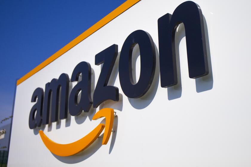 FILE - The Amazon logo is seen in Douai, northern France, April 16, 2020. In August 2022, Amazon has said it will spend billions of dollars in two gigantic acquisitions that, if approved, will broaden its ever growing presence in the lives of consumers. This time, the company is targeting two areas: health care and the "smart home." (AP Photo/Michel Spingler, File)