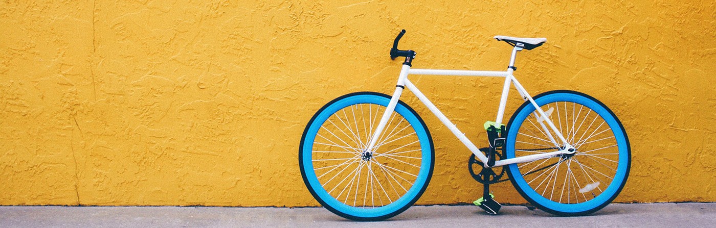 Bicycle leaning against wall