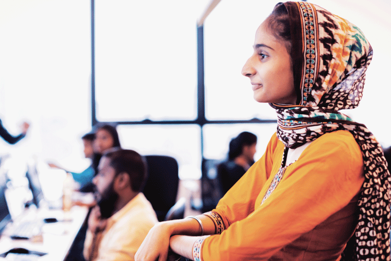 Photo of student looking at computer monitor