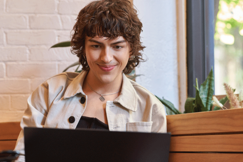 Photo of student working on laptop