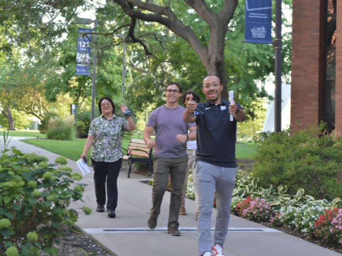 Students returning to the law school after the Scavenger Hunt