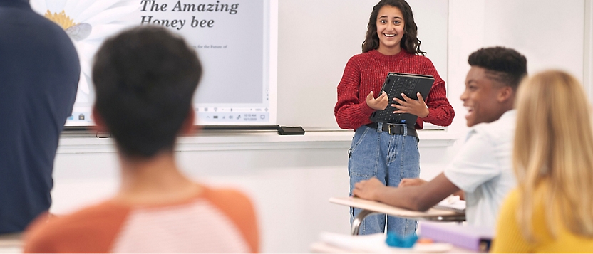 A person standing in front of a whiteboard