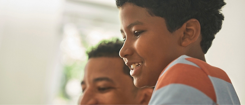 A close-up of a child smiling