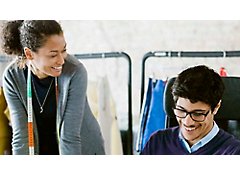 A man and women talking each other with smiling face