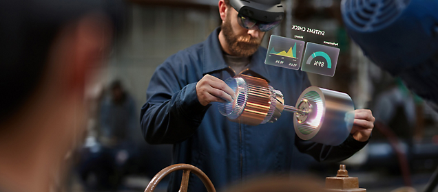 Mand, der bruger augmented reality-grænseflade, mens han arbejder på en mekanisk del.
