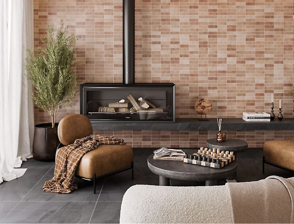 Modern living room with a wall-mounted fireplace, tan chairs, a round coffee table with a chess set