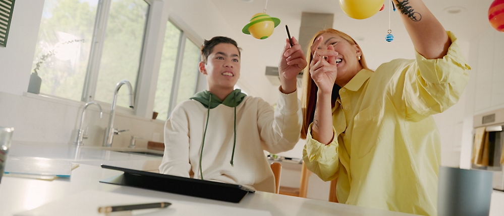 A person and another person playing with a ball.