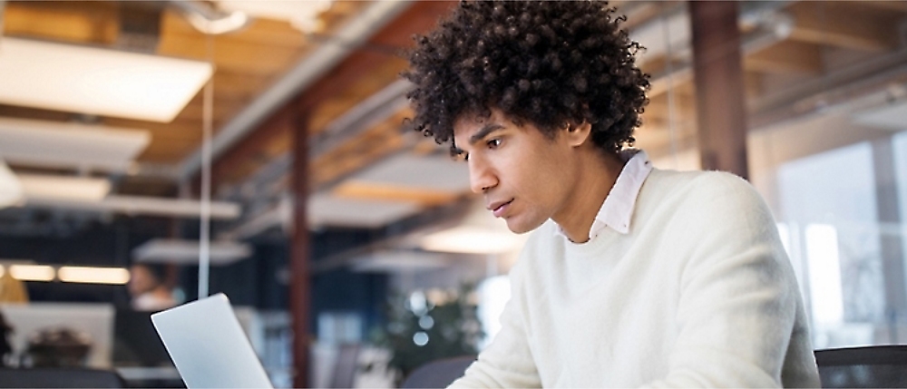 A person looking at a computer