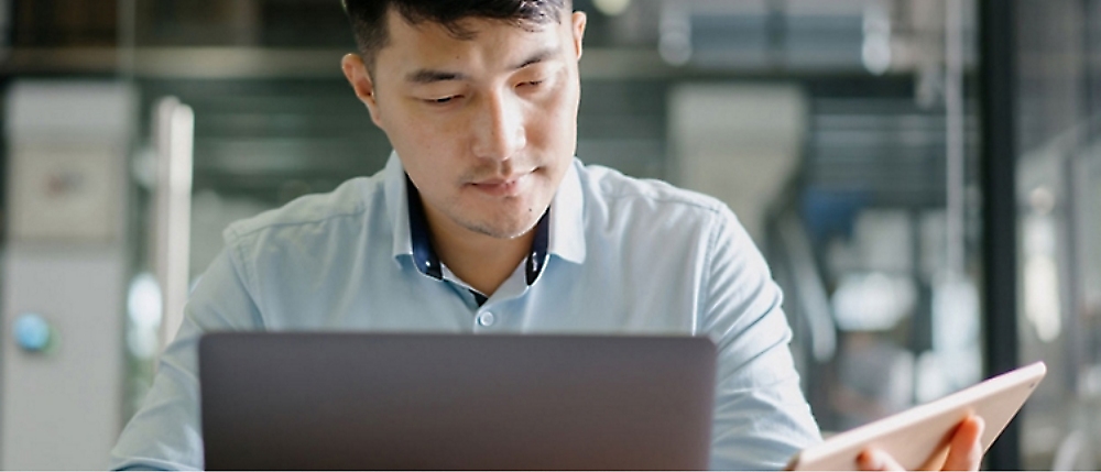 A person looking at a computer