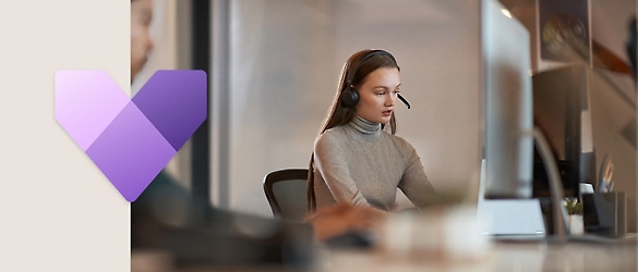 A girl having headphone working on laptop.