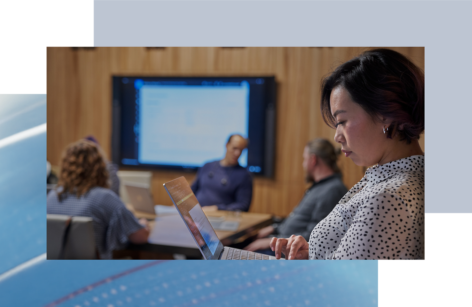 A person sitting in front of a computer